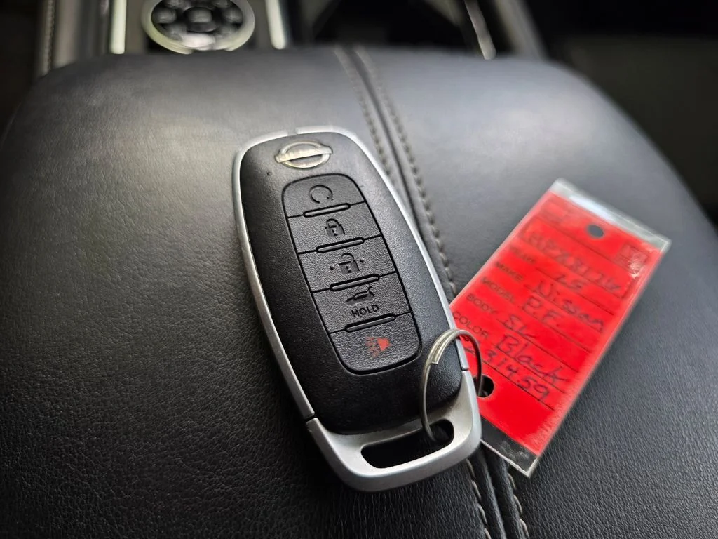 Used 2025 Super Black Nissan SL image 29