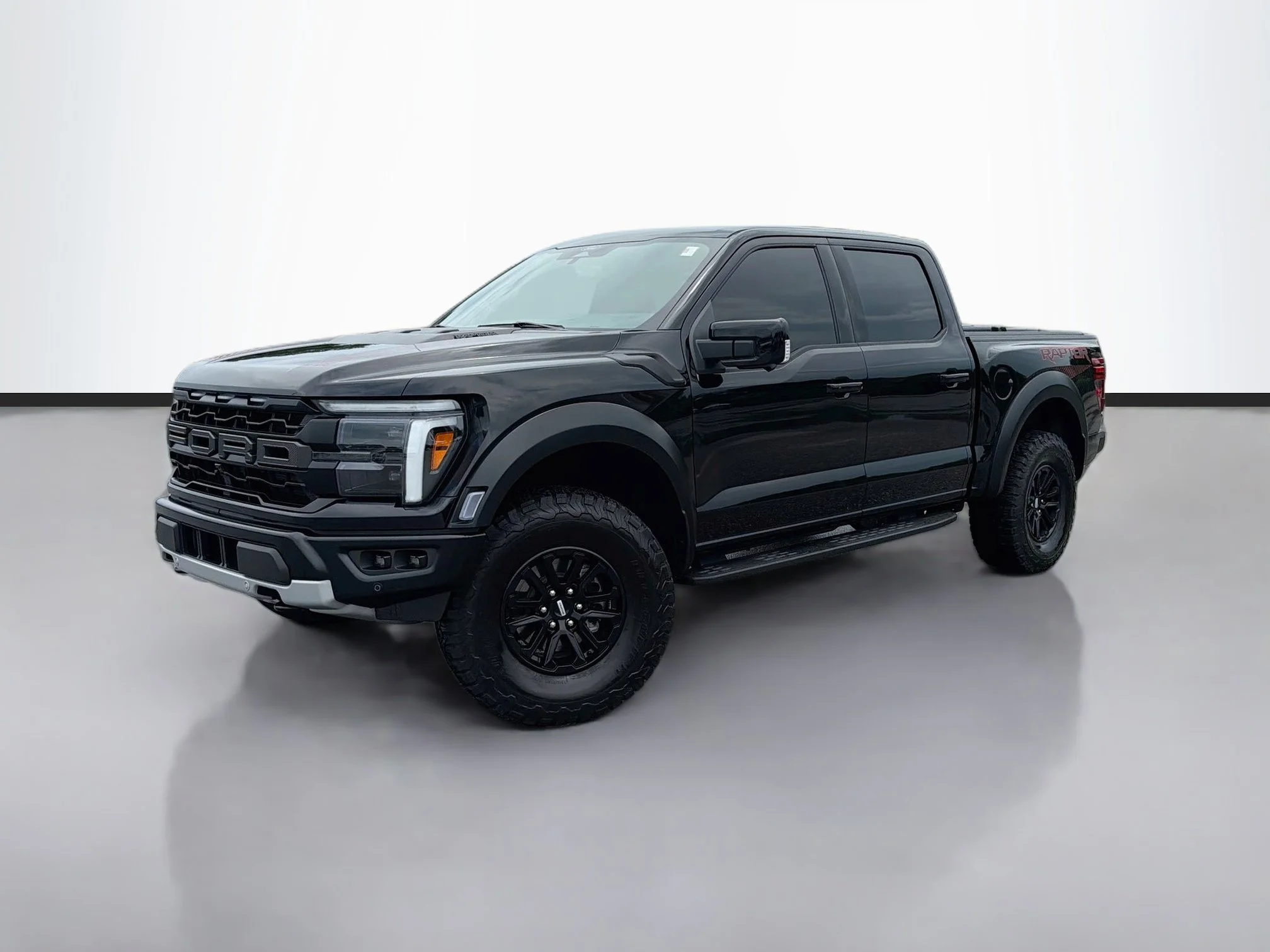 Used 2025 Black Metallic Ford Raptor image 1