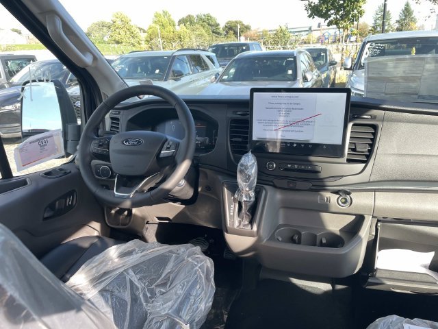 New 2027 Agate Black Metallic Ford Passenger Van XL image 8