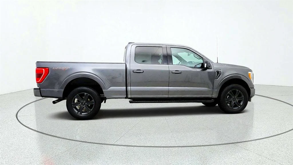 Used 2023 Carbonized Gray Metallic Ford XLT 4WD SuperCrew 6.5
