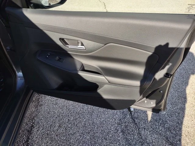 Used 2027 Gun Metallic Nissan SV image 25