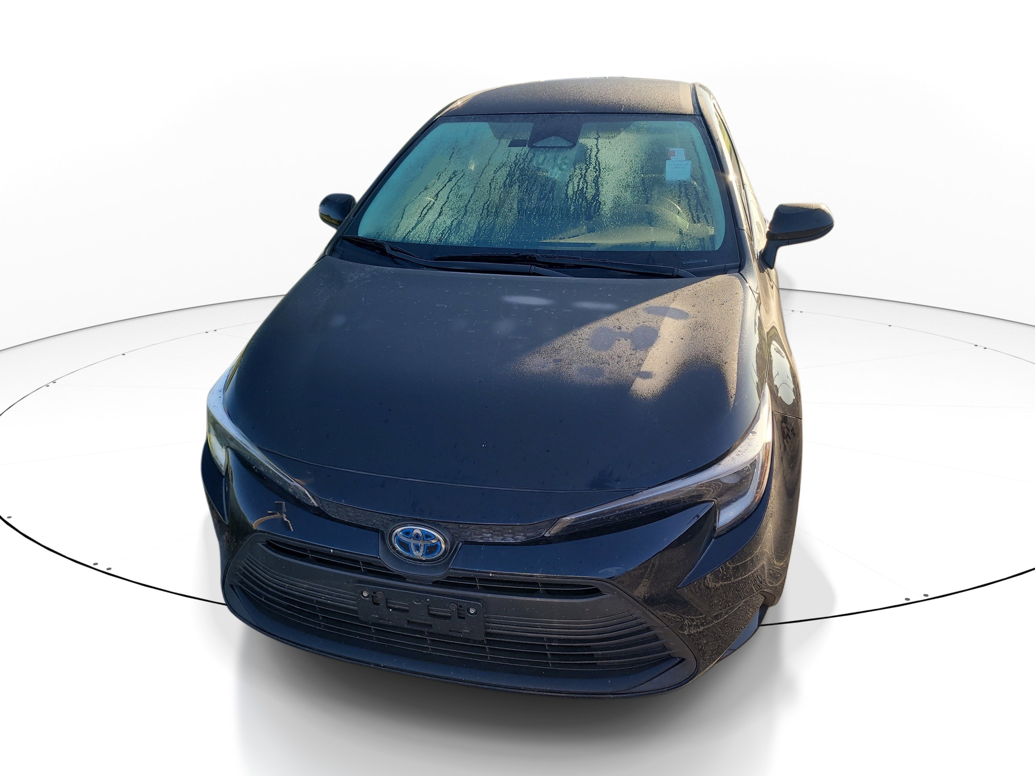 Used 2023 Midnight Black Metallic Toyota Hybrid LE image 2