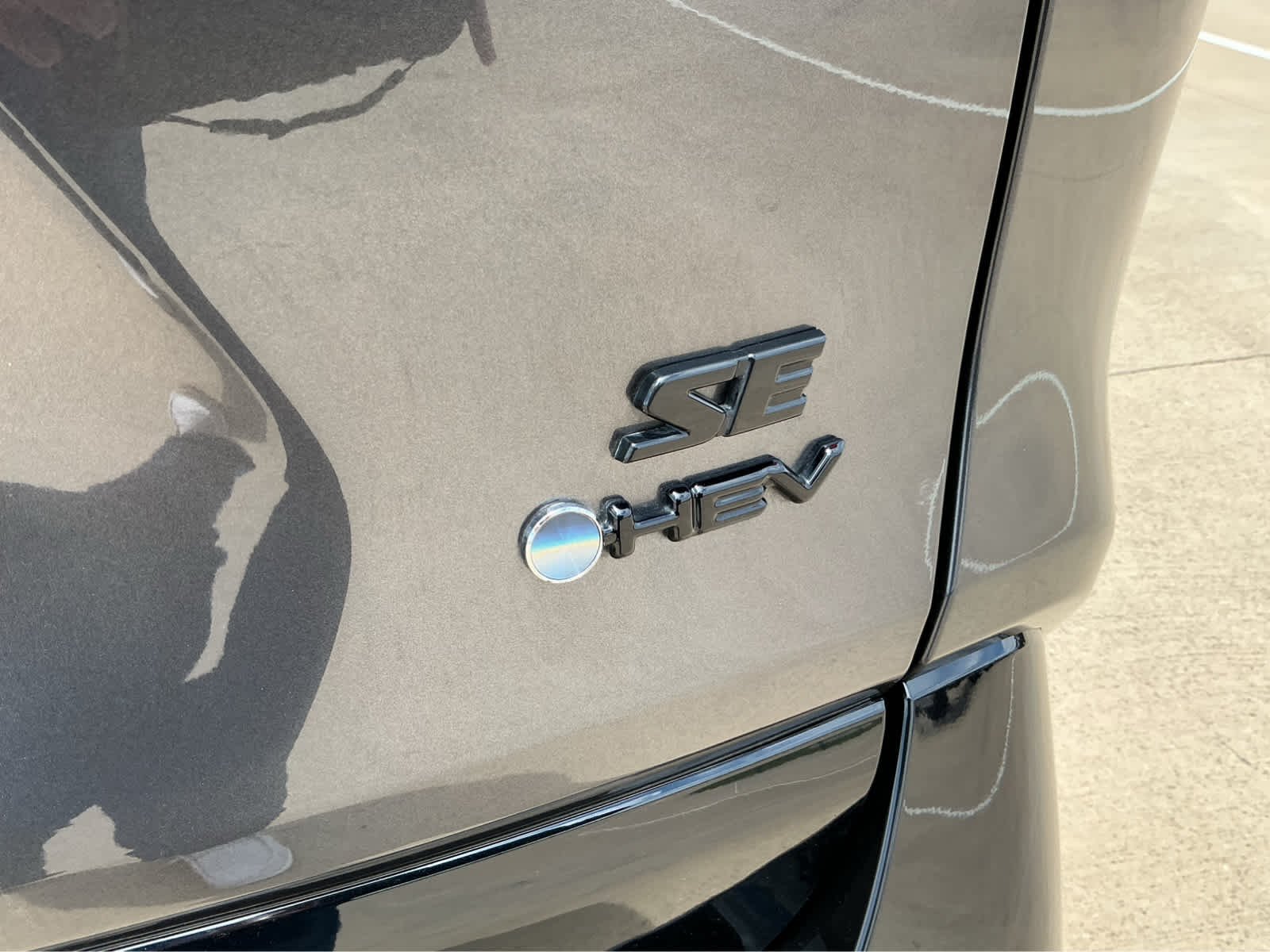 Used 2025 Magnetic Gray Metallic Toyota Hybrid SE image 9