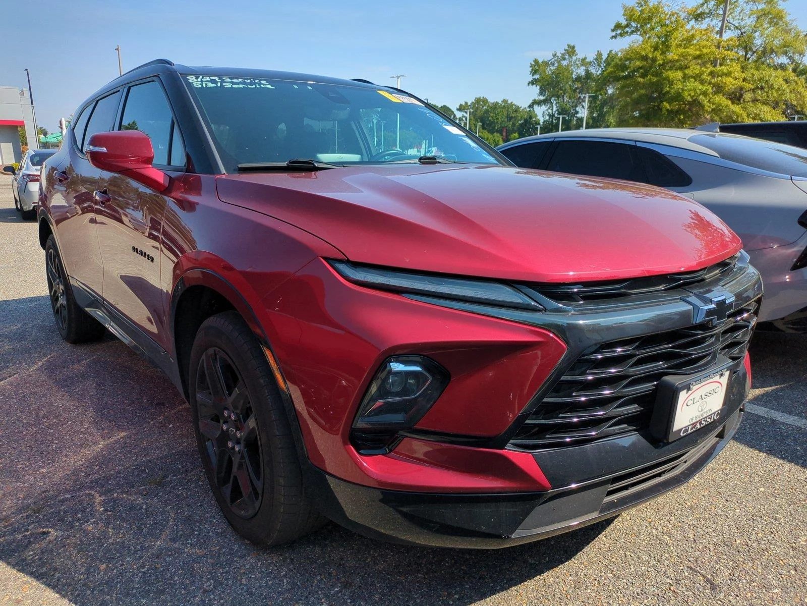 Used 2023 Radiant Red Tintcoat Chevrolet RS image 1