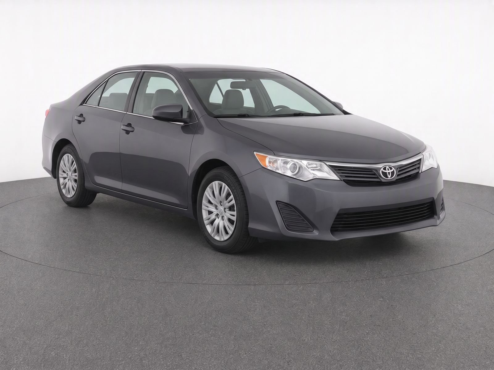 Used 2012 Magnetic Gray Metallic Toyota L image 1