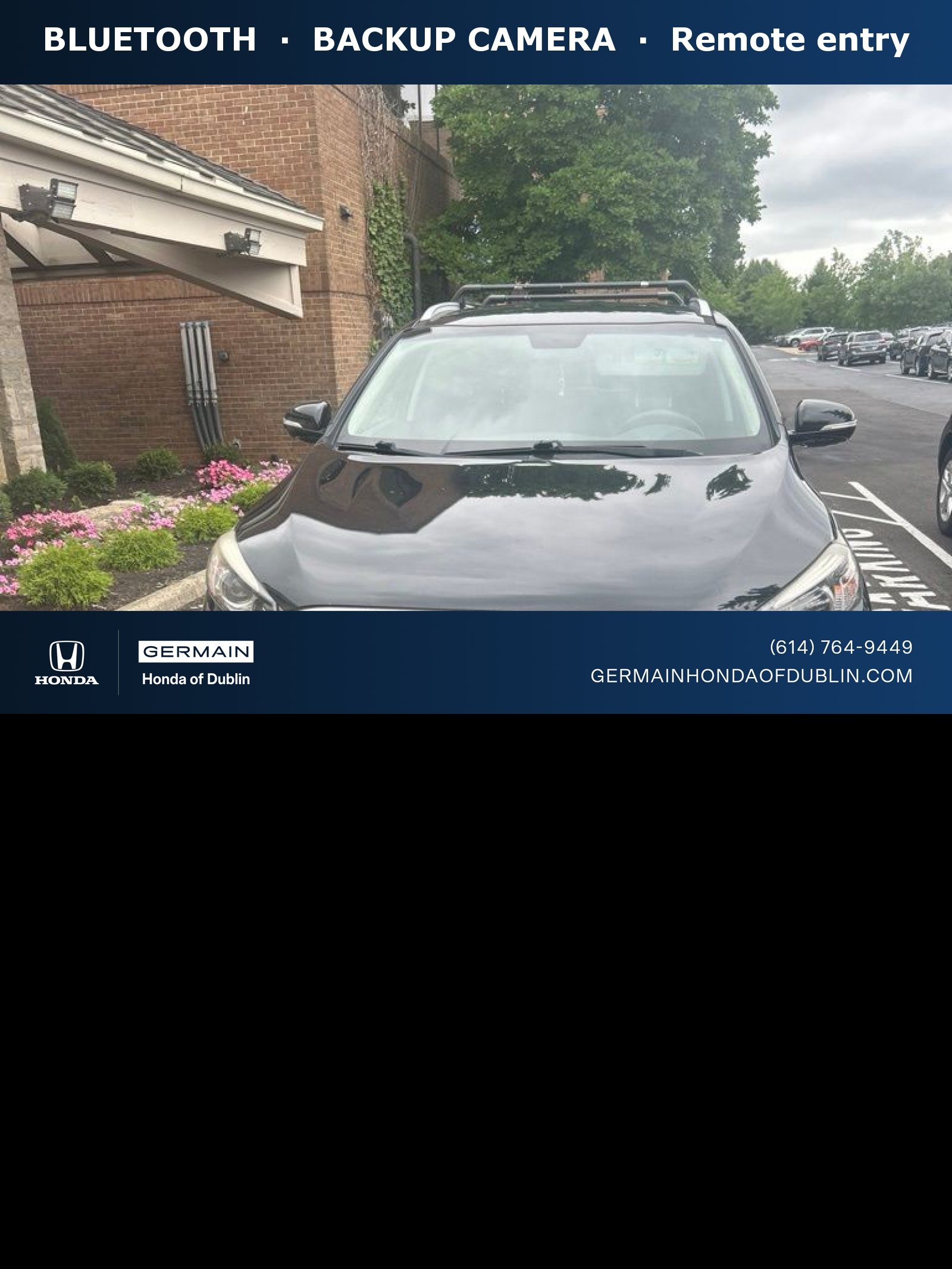 Used 2016 Ebony Black Kia LX image 1