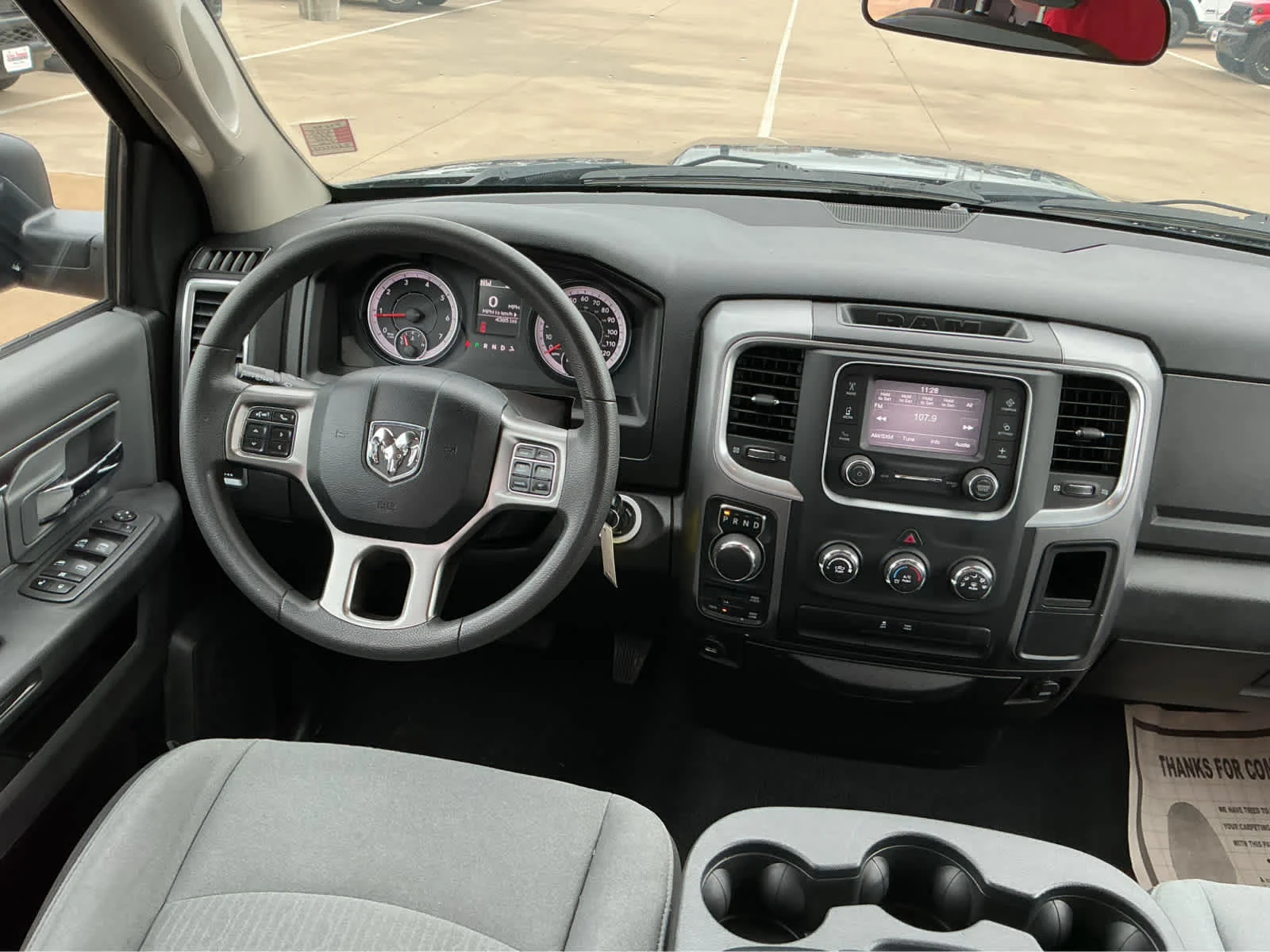 Used 2024 Granite Crystal Metallic Clearcoat Ram SLT image 25
