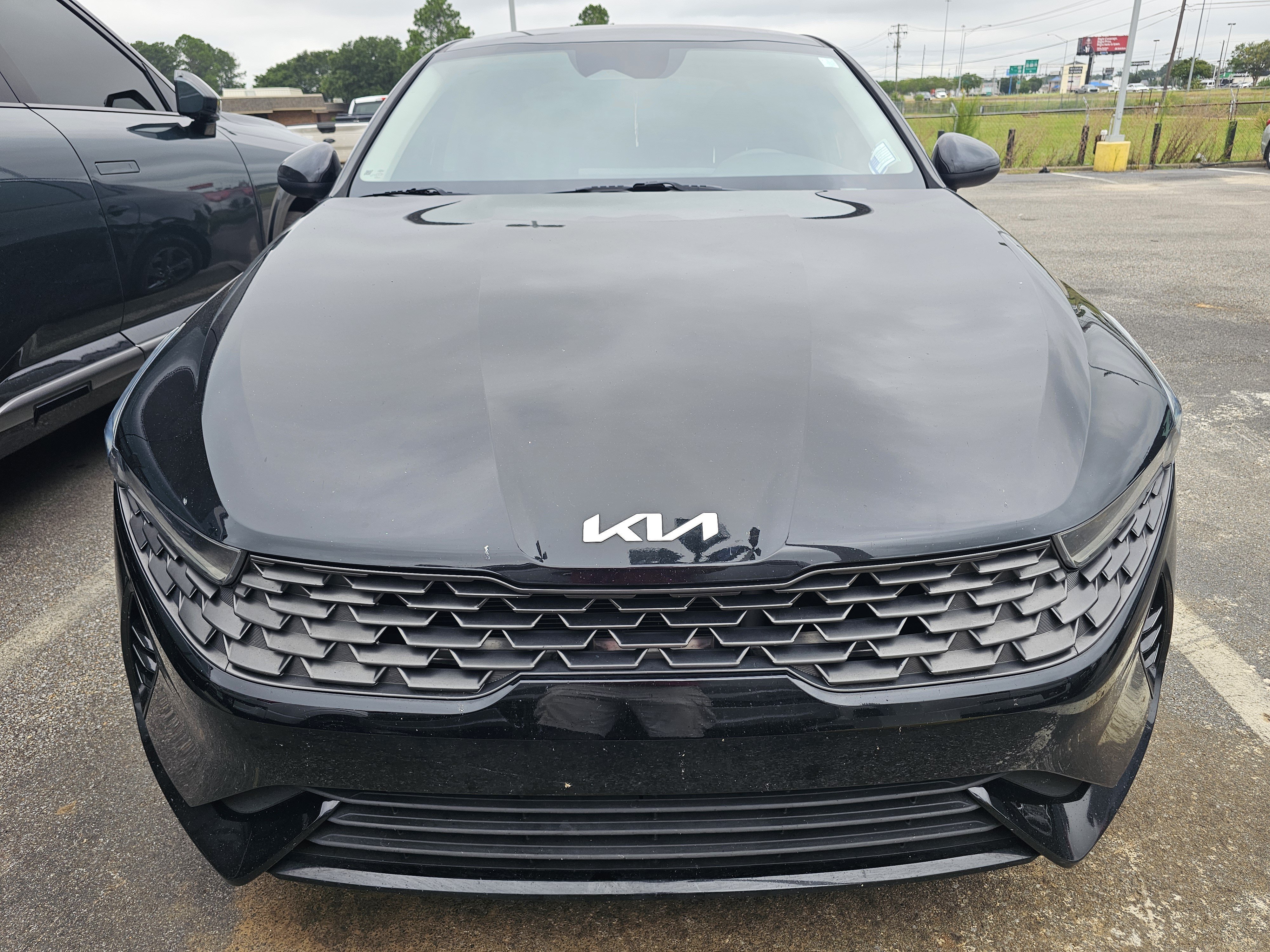 Used 2022 Ebony Black Kia LXS image 2