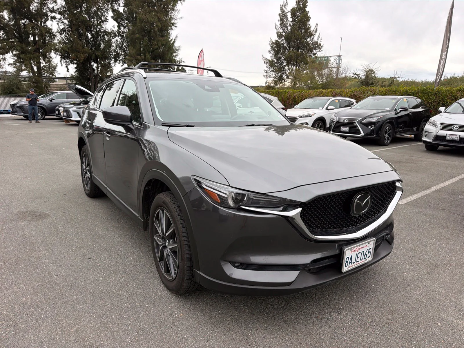Used 2017 Machine Gray Mazda Grand Touring image 1