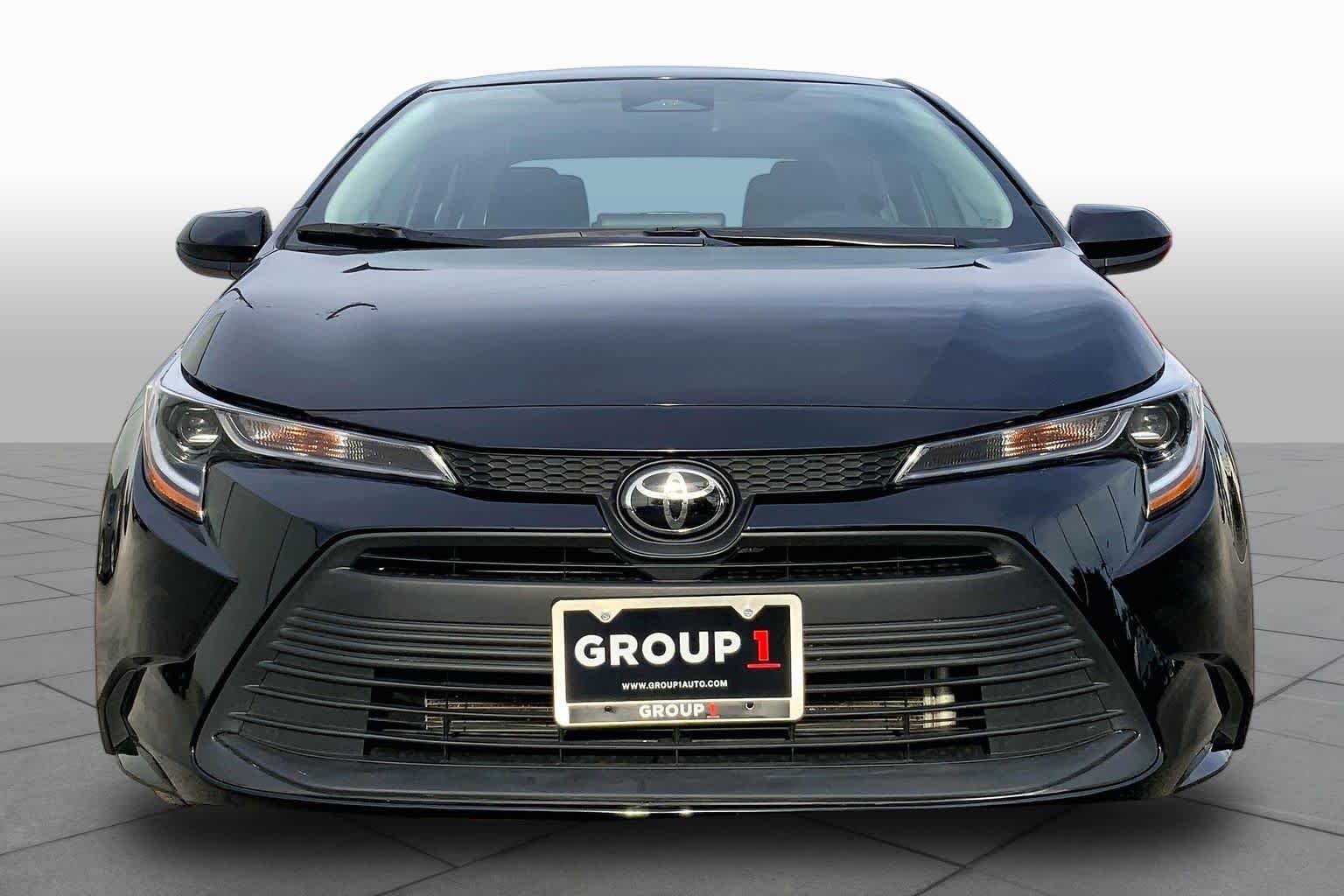 Used 2025 Midnight Black Metallic Toyota LE image 4