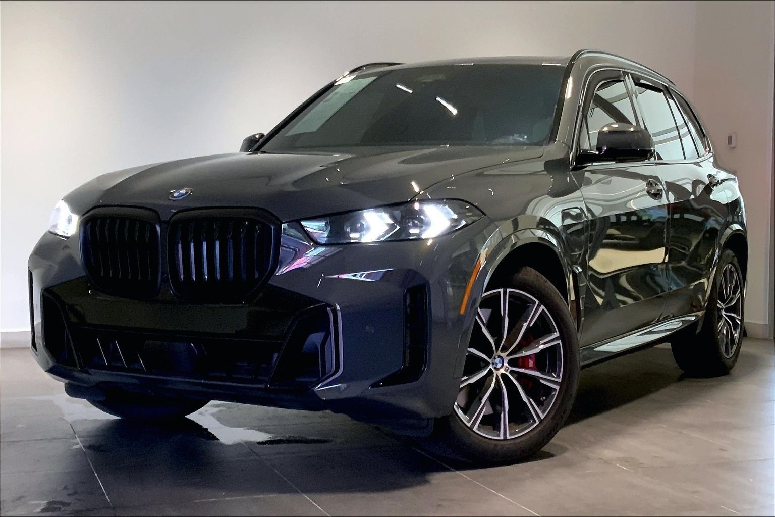 Used 2026 Gray Metallic BMW xDrive50e image 1