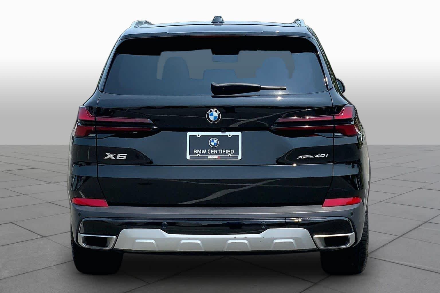 Certified Used 2024 Black Sapphire Metallic BMW xDrive40i image 4