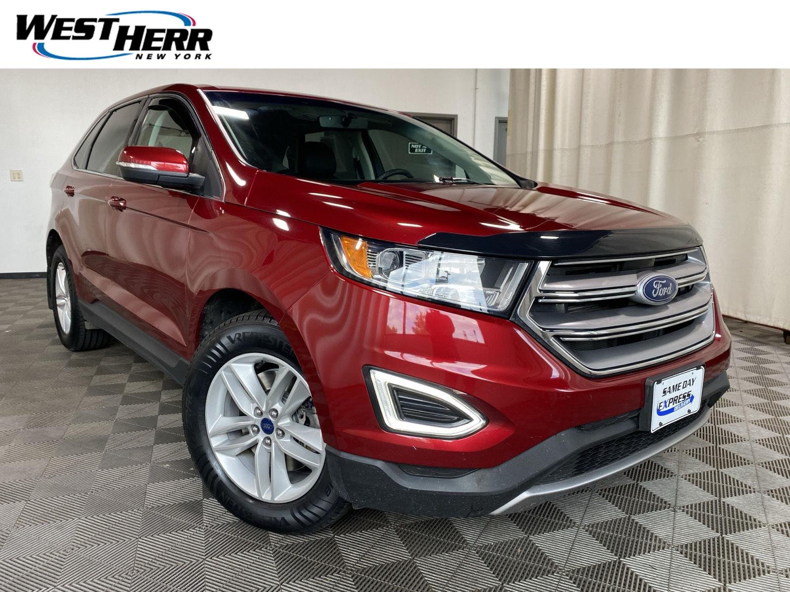 Used 2018 Ruby Red Metallic Tinted Clearcoat Ford SEL image 1