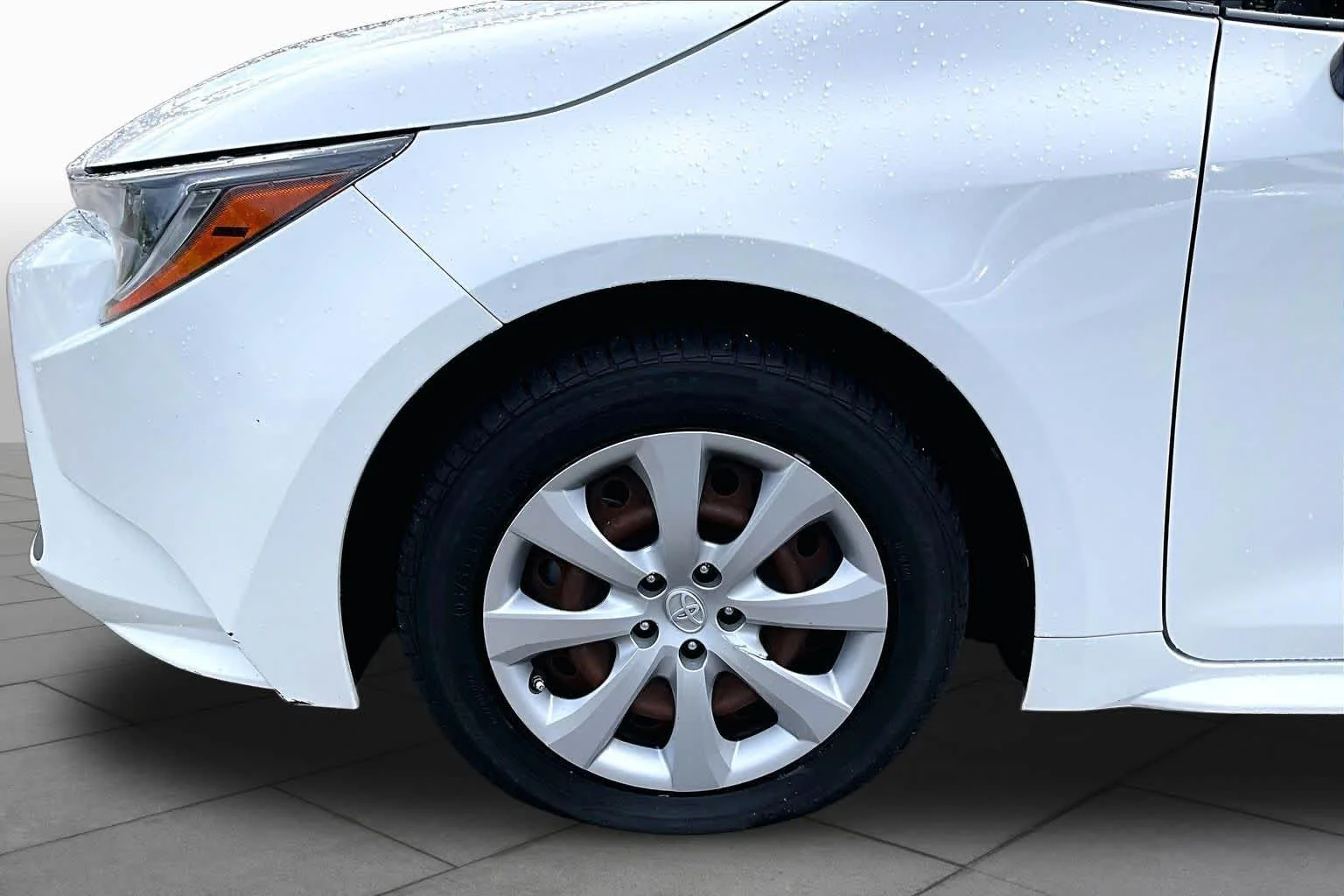 Used 2021 Super White Toyota LE image 11