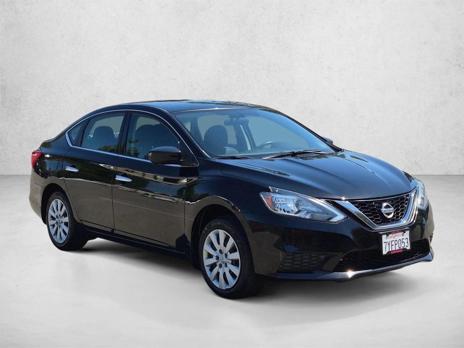 Used 2017 Super Black Nissan SV image 3