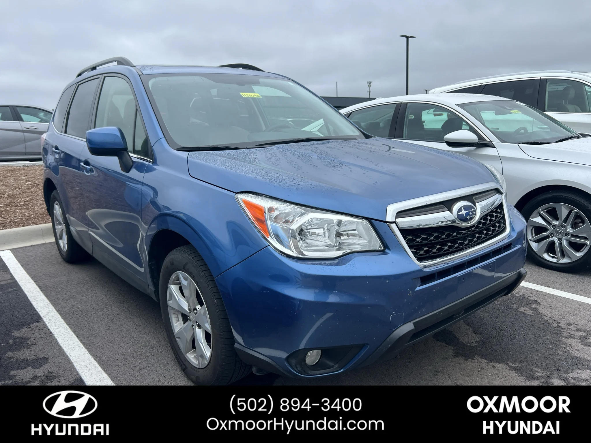 Used 2016 Quartz Blue Pearl Subaru 2.5i Limited image 1