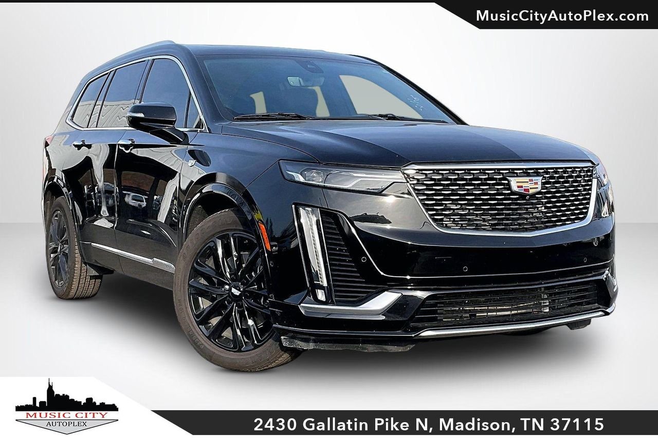 Used 2022 Stellar Black Metallic Cadillac FWD Premium Luxury image 1