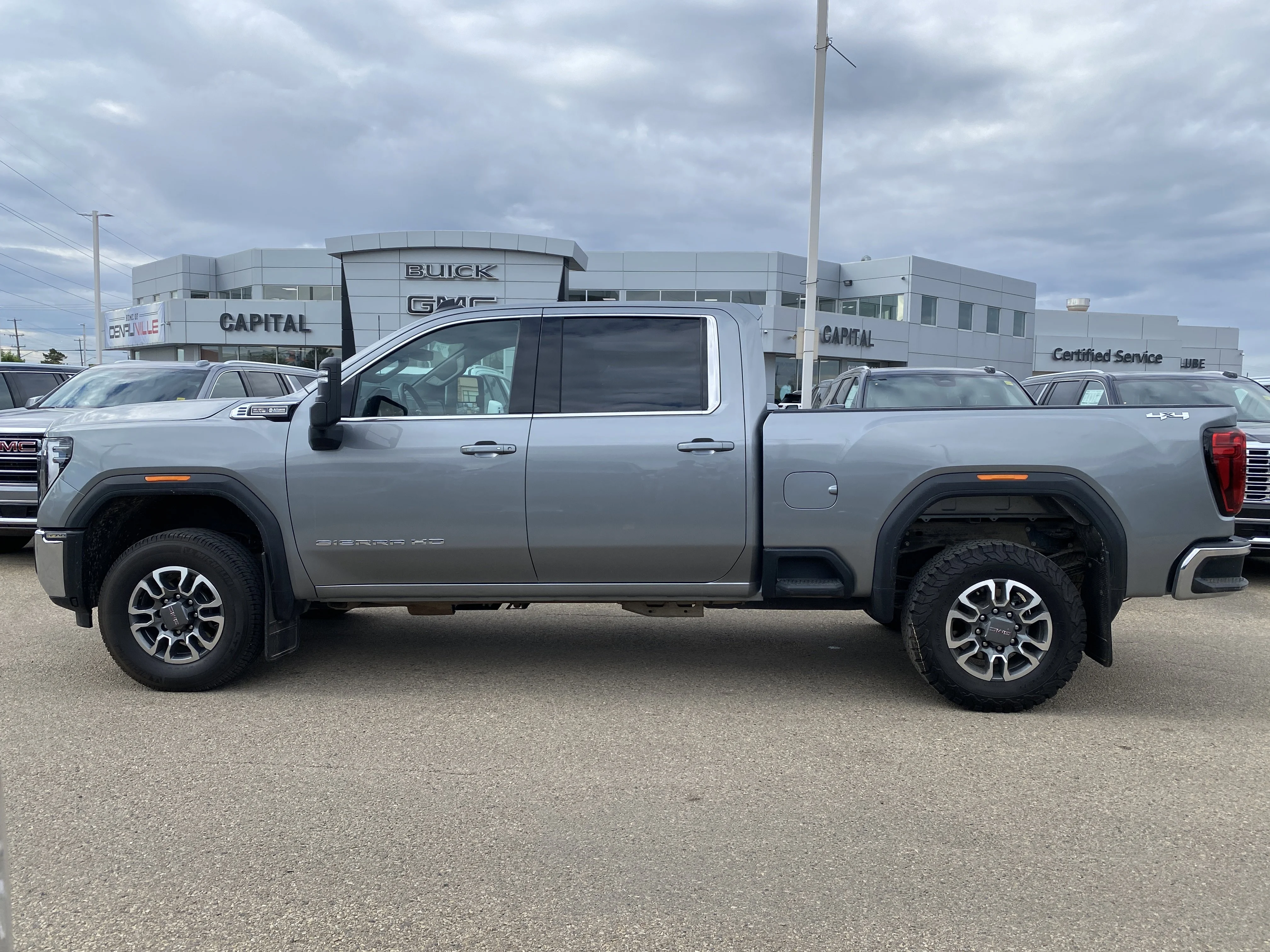 Certified Used 2024 Silver GMC Crew Cab SLE image 2