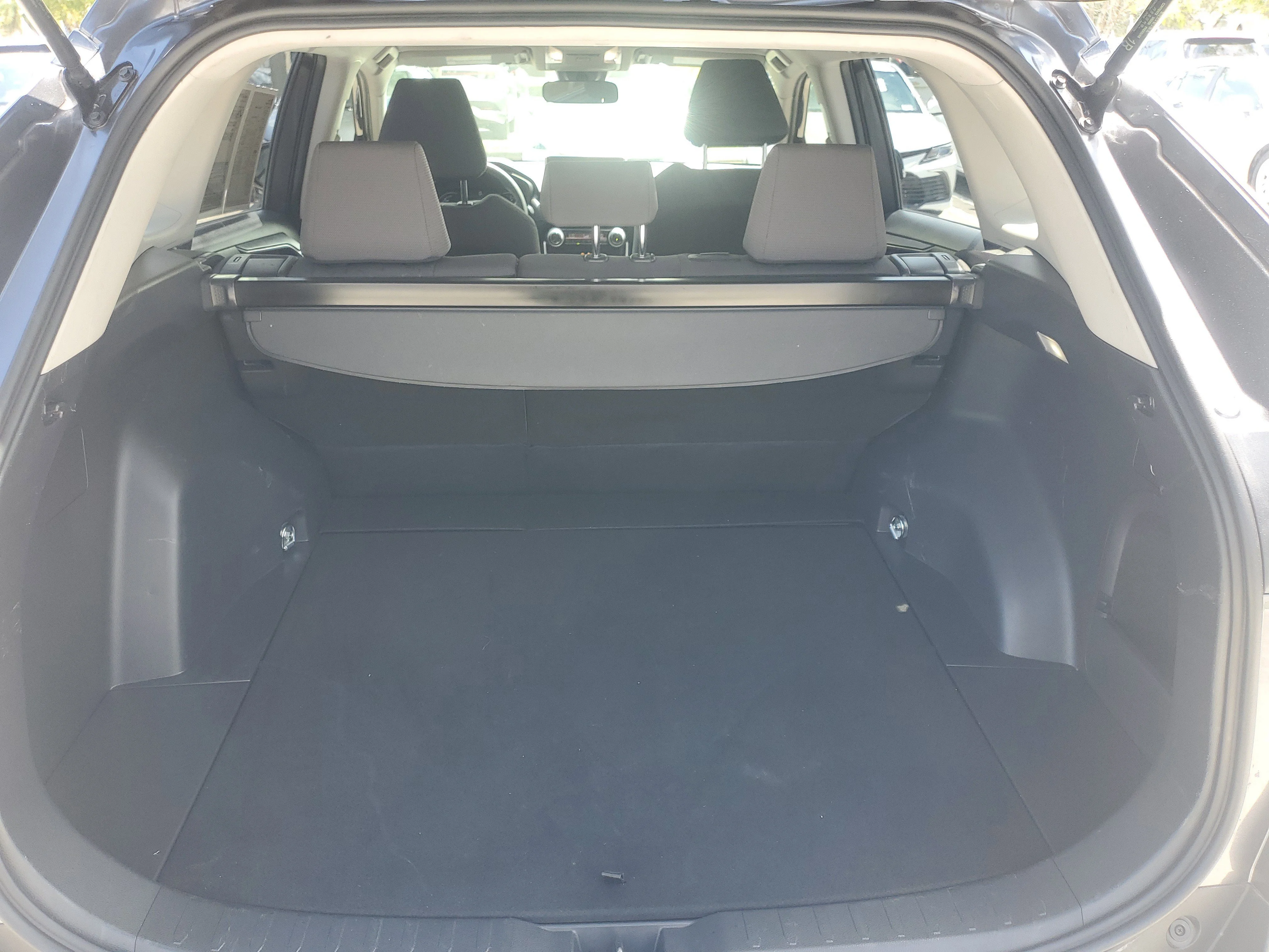 Certified Used 2025 Magnetic Gray Metallic/Midnight Black Metallic Toyota Hybrid XLE image 9