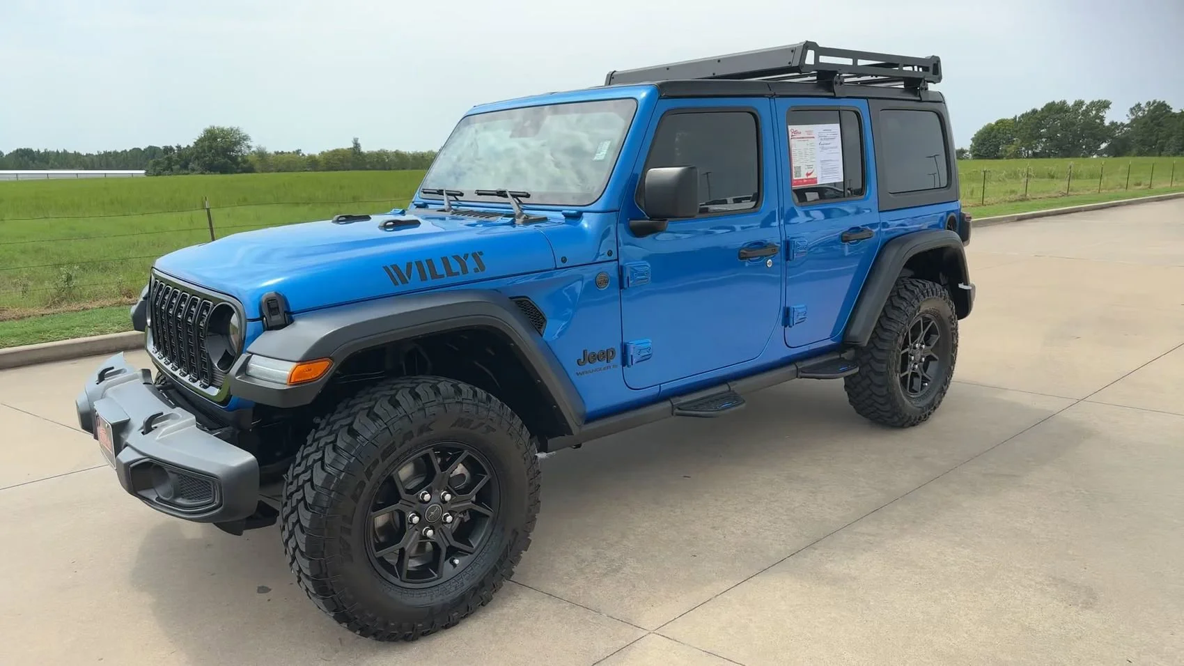 Used 2024 Hydro Blue Pearl Coat Jeep Sport image 5