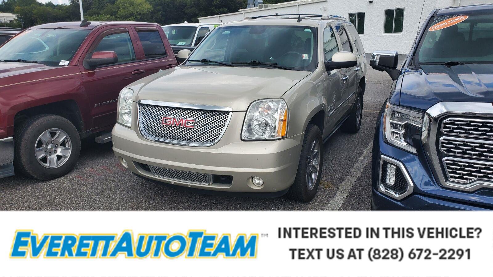 Used 2013 CHAMPAGNE SILVER METALLIC GMC Denali image 1