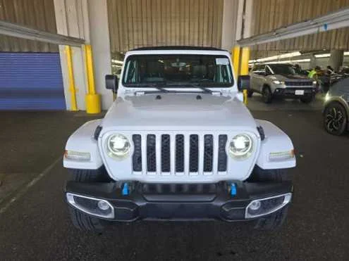 Used 2022 Jeep Wrangler Unlimited Sahara 4XE with VIN 1C4JJXP66NW205489 for sale in Kansas City