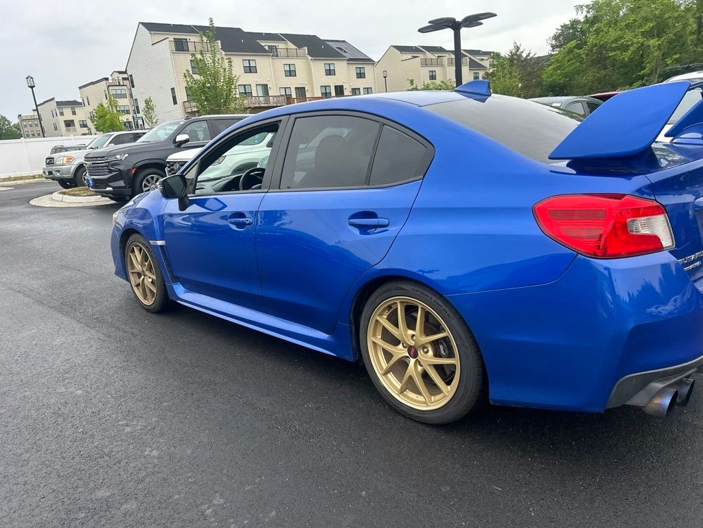 Used 2015 Blue Pearl Subaru WRX STi image 4