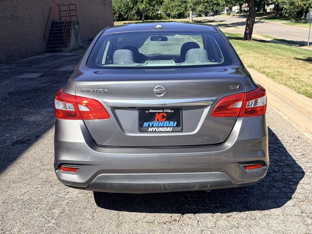 Used 2018 Gun Metallic Nissan SV image 4