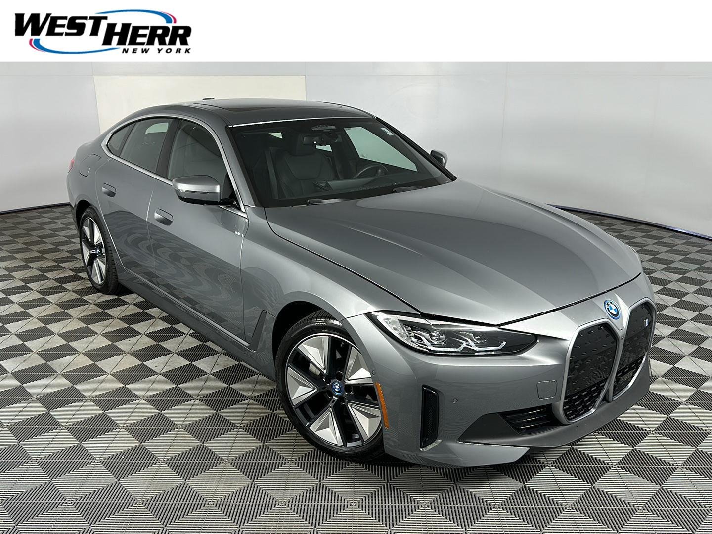 Used 2023 Skyscraper Grey Metallic BMW eDrive40 image 1
