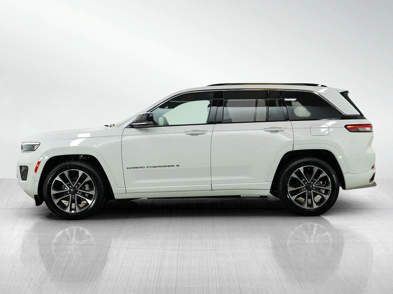 Used 2023 Jeep Grand Cherokee Overland with VIN 1C4RJHDGXPC519575 for sale in Hopkins, Minnesota