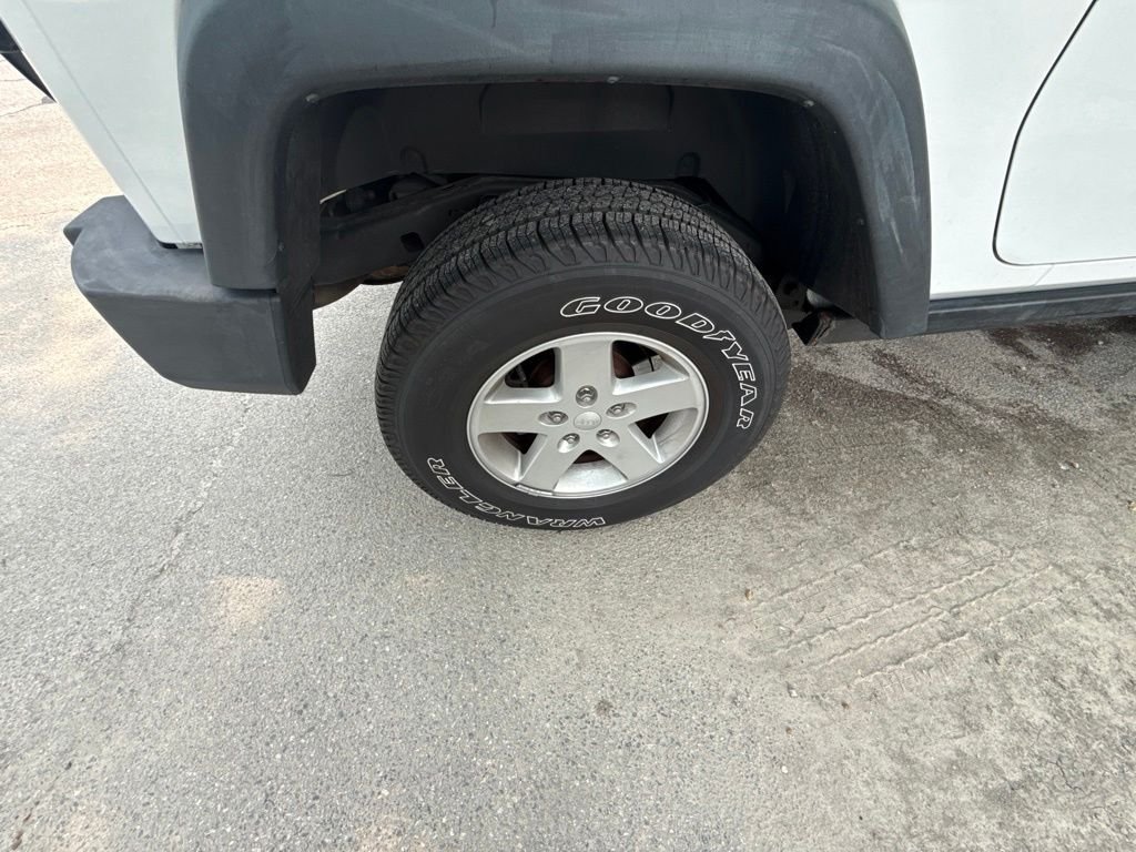 Used 2013 White Jeep Sport image 11