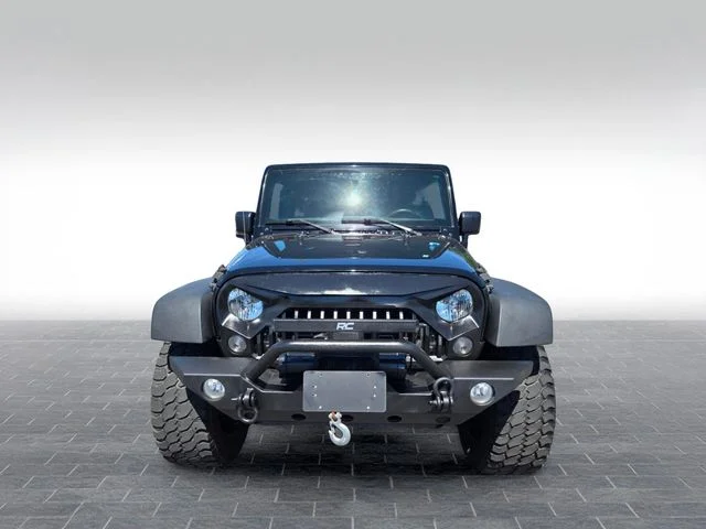 Used 2015 Black Jeep Unlimited Sport image 2