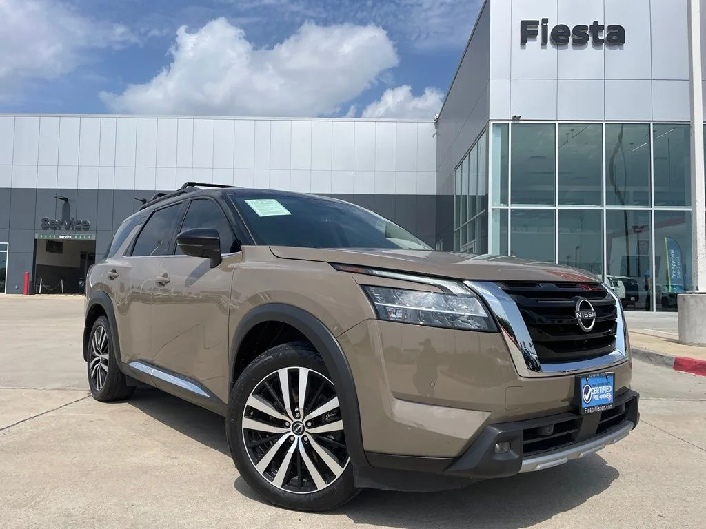 Used 2024 Black Nissan Platinum image 1