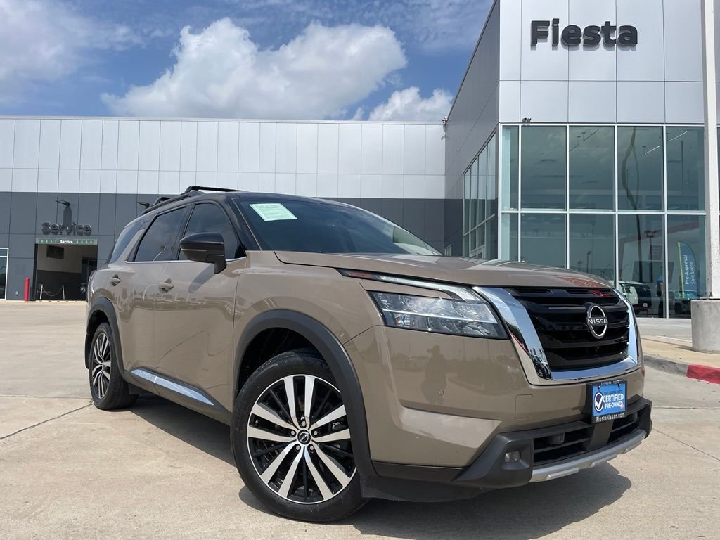 Used 2024 Black Nissan Platinum image 1