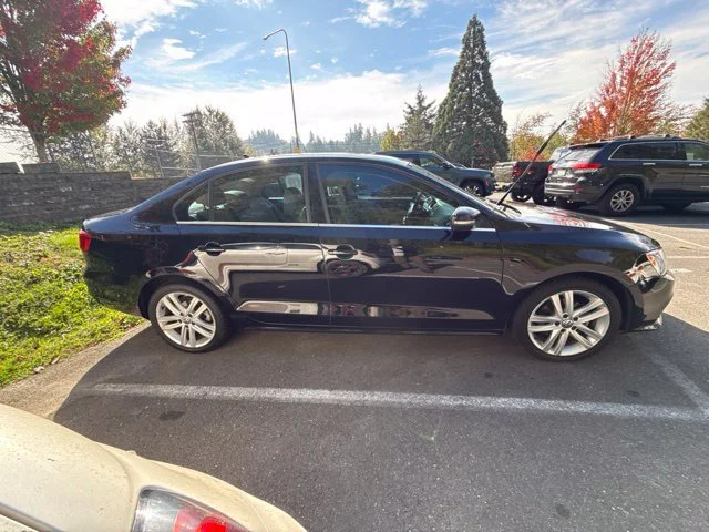 Used 2015 Black Volkswagen 2.0L TDI SEL image 8