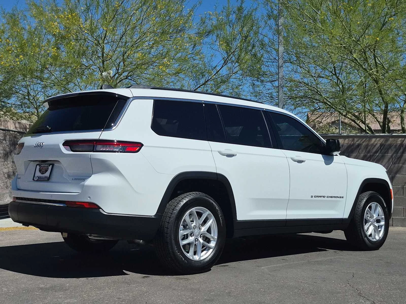 Used 2025 Bright White Clearcoat Jeep Laredo image 8