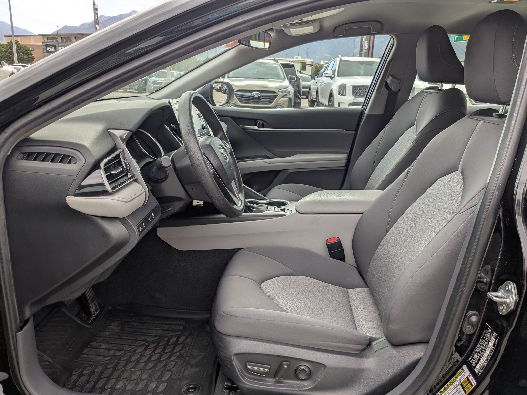 Used 2023 Midnight Black Metallic Toyota LE image 24