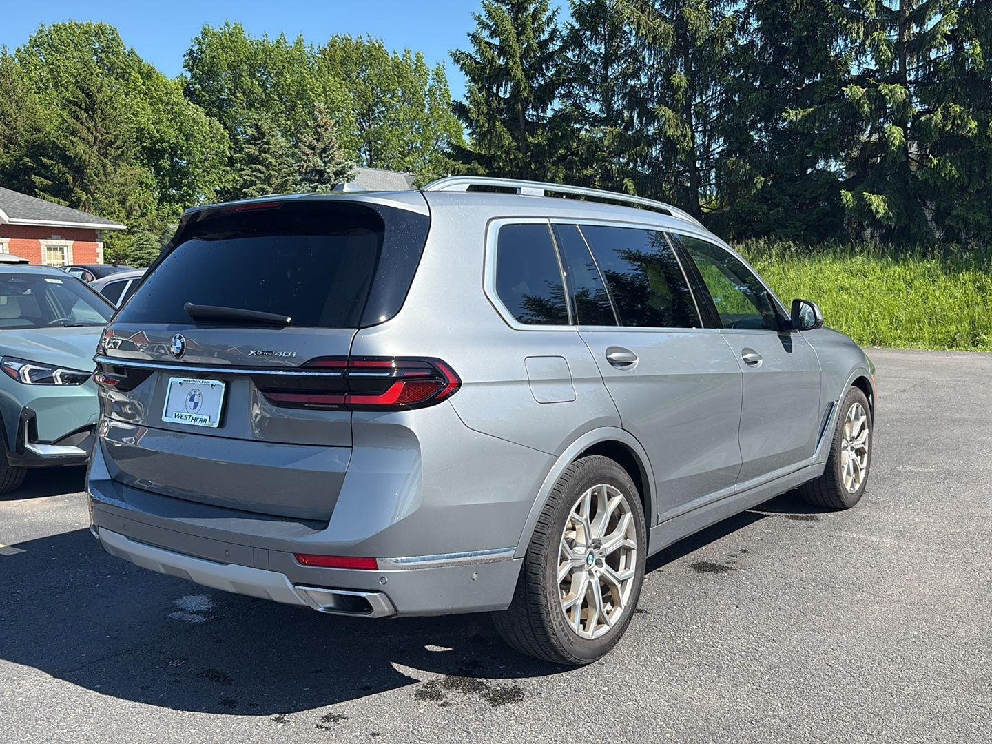 Used 2024 Skyscraper Grey Metallic BMW xDrive40i image 3