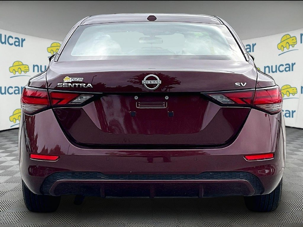 Used 2024 Rosewood Metallic Nissan SV image 5