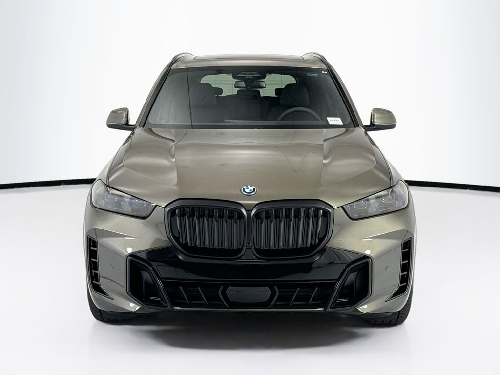 New 2026 Green Metallic BMW xDrive50e image 2