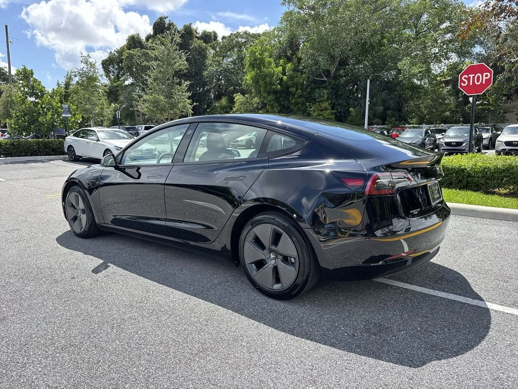 Used 2023 Solid Black Tesla  image 12