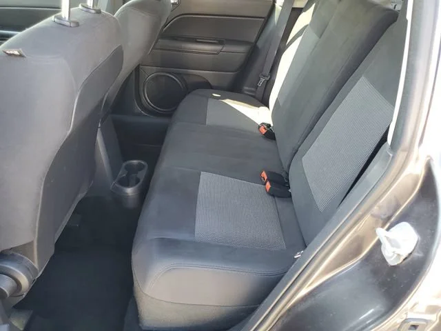 Used 2014 Granite Crystal Jeep Sport image 19