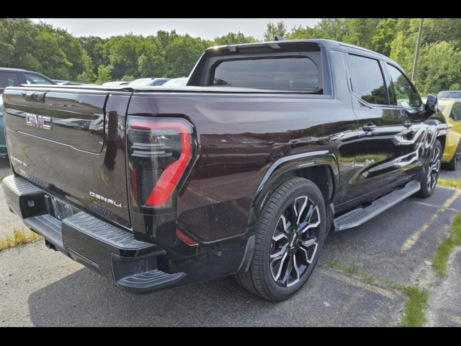 Used 2026 Dark Ember Metallic GMC Denali Max Range image 3