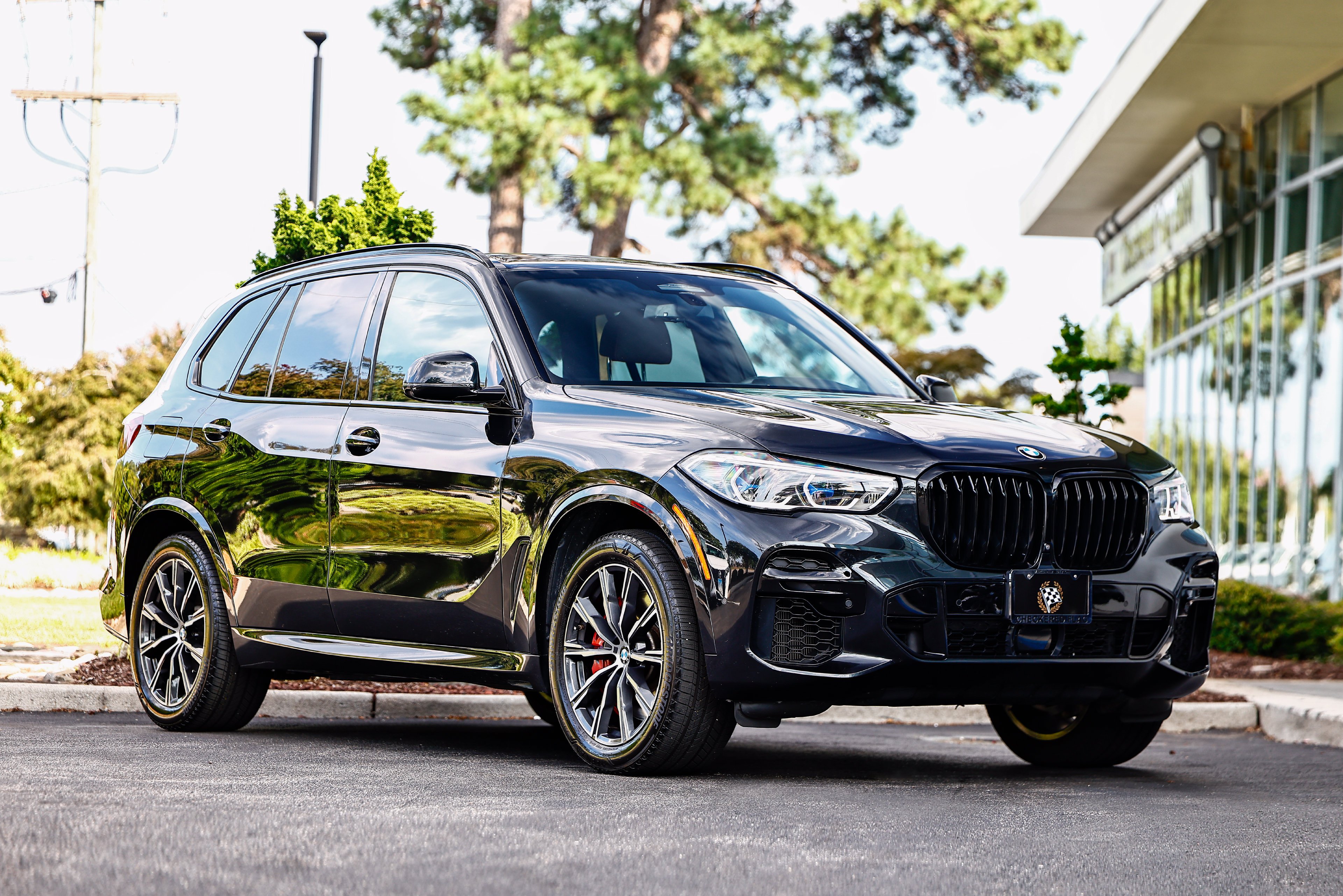 Used 2023 Black Sapphire Metallic BMW M50i image 1