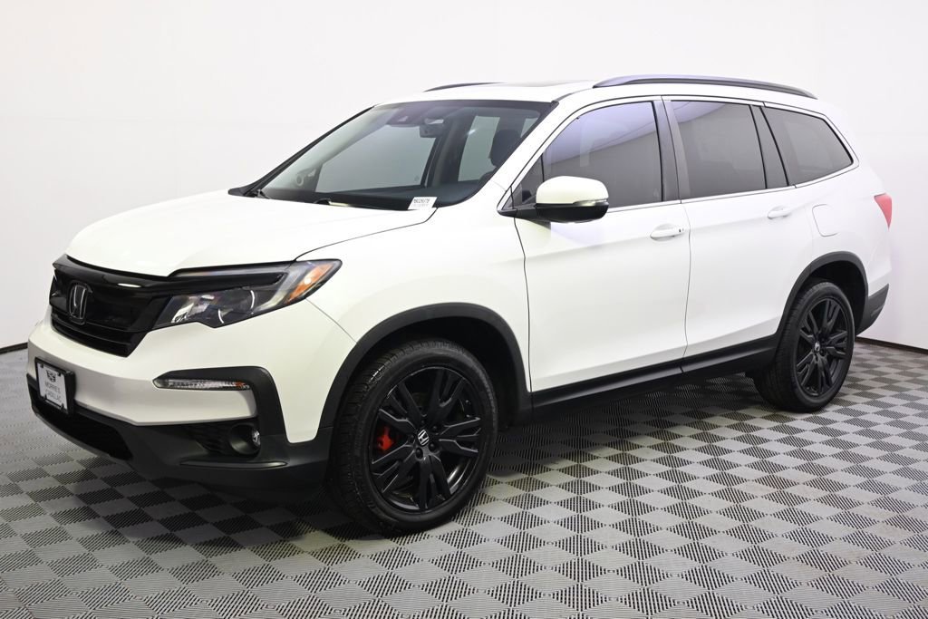 Used 2021 Honda Pilot SE with VIN 5FNYF6H23MB029378 for sale in Minneapolis, Minnesota