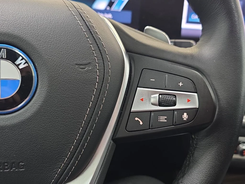 Used 2025 Black Sapphire Metallic BMW xDrive50e image 17
