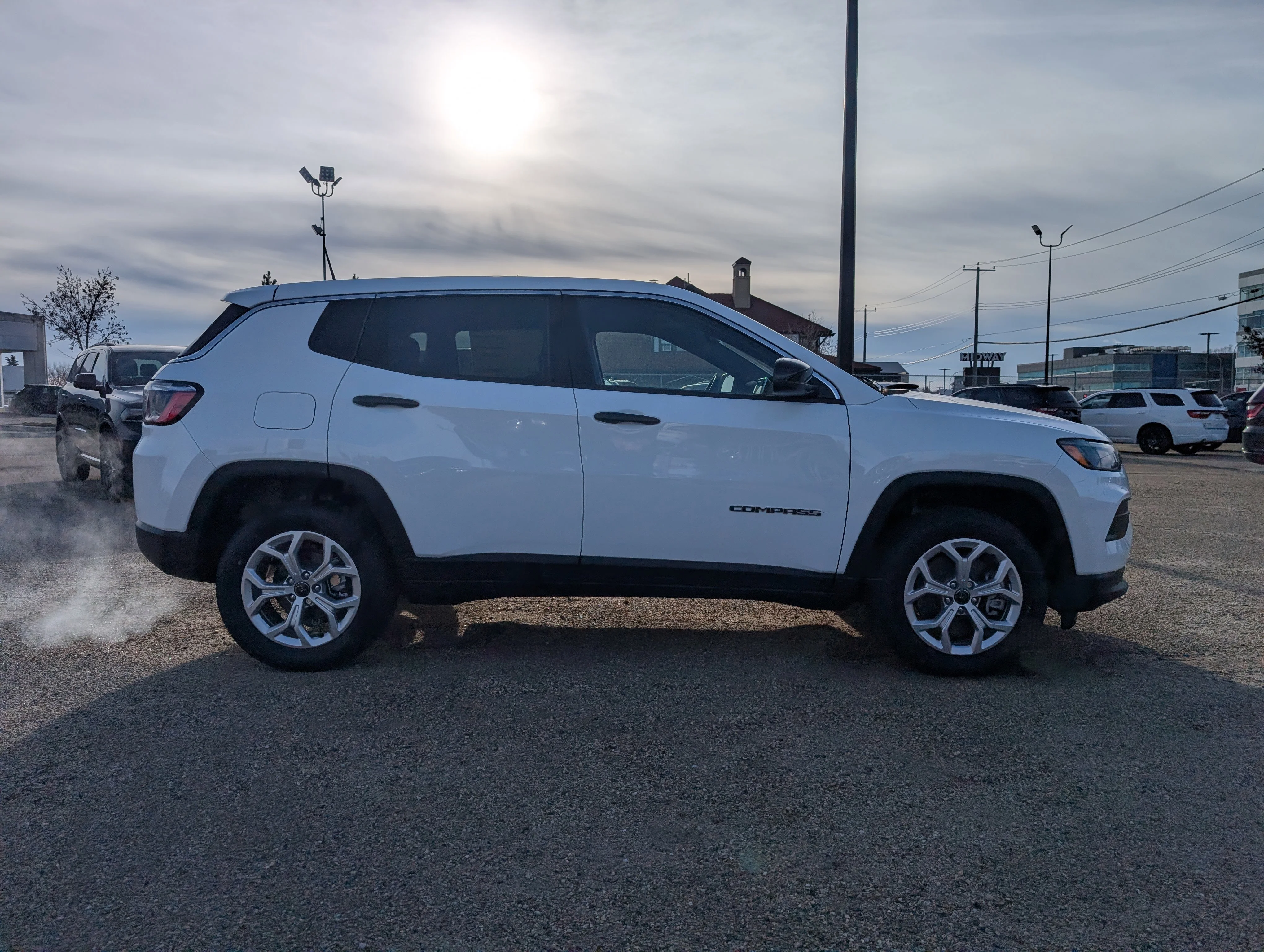 New 2026 Bright White Jeep Sport image 8