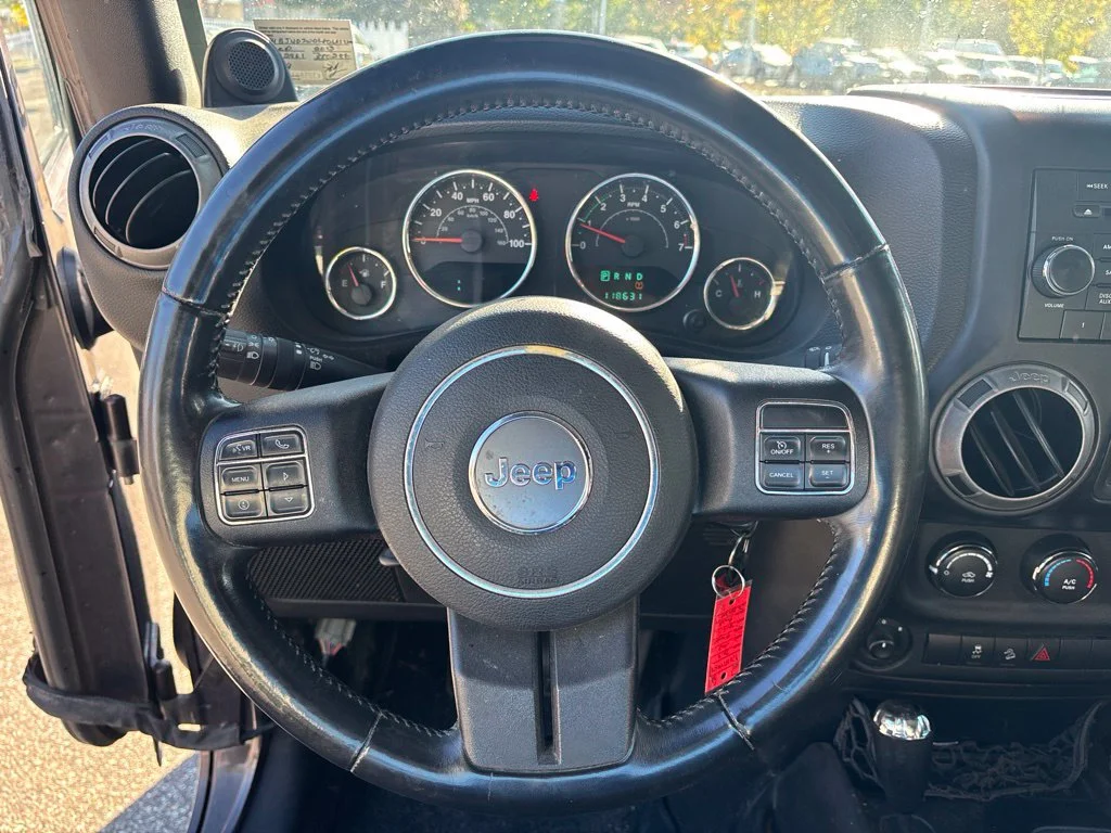 Used 2013 Brown Jeep Unlimited Sport image 9