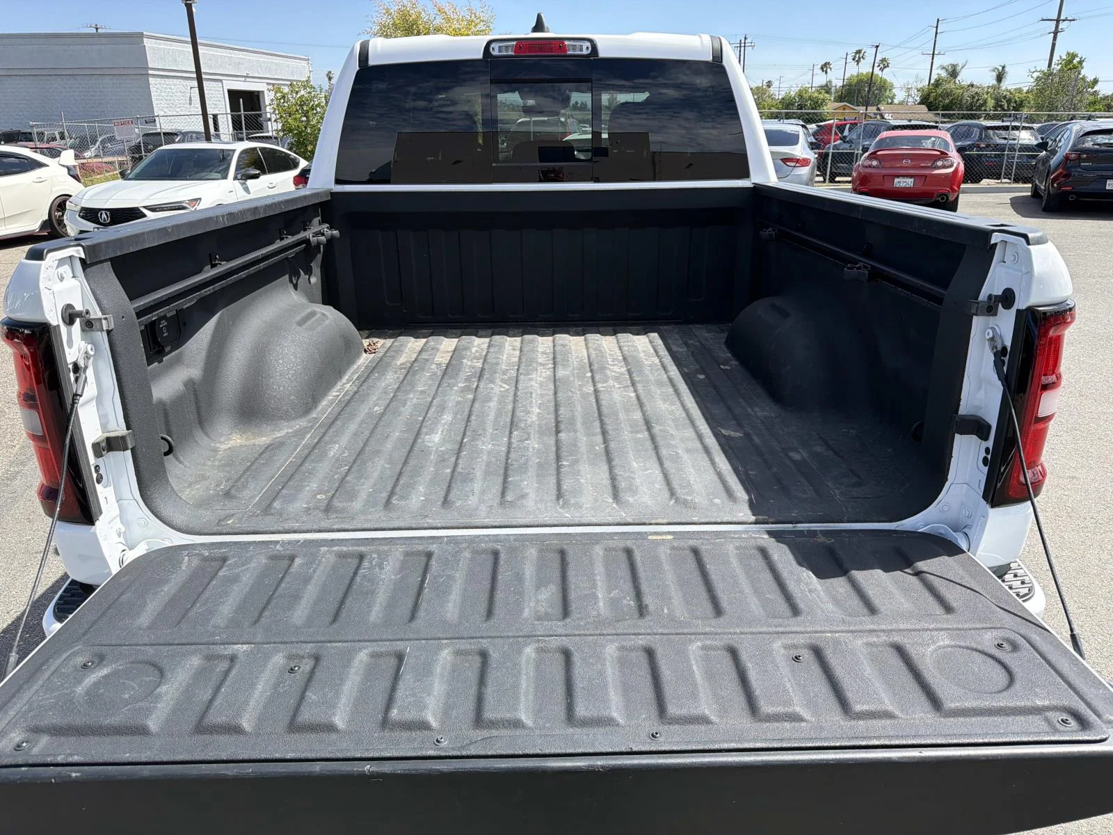 Used 2025 BRIGHT WHITE CL Ram Big Horn 4x4 Crew Cab 5