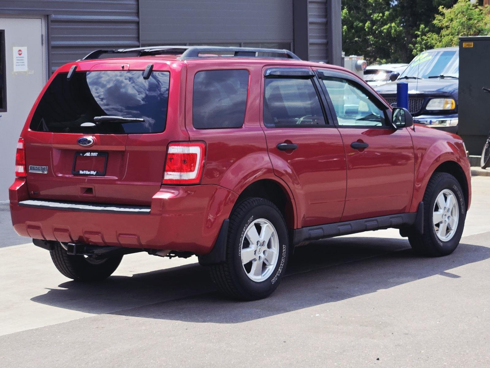 Used 2011 Sangria Red Metallic Ford XLT image 4